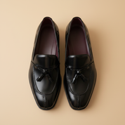 Par mocassins tassel preto polido — overhead