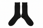 Meias pretas caneladas - vista completa flat lay